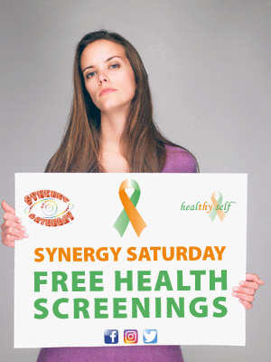 woman holding synergy saturday sign.